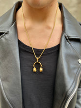 Collana con cuffie dorate